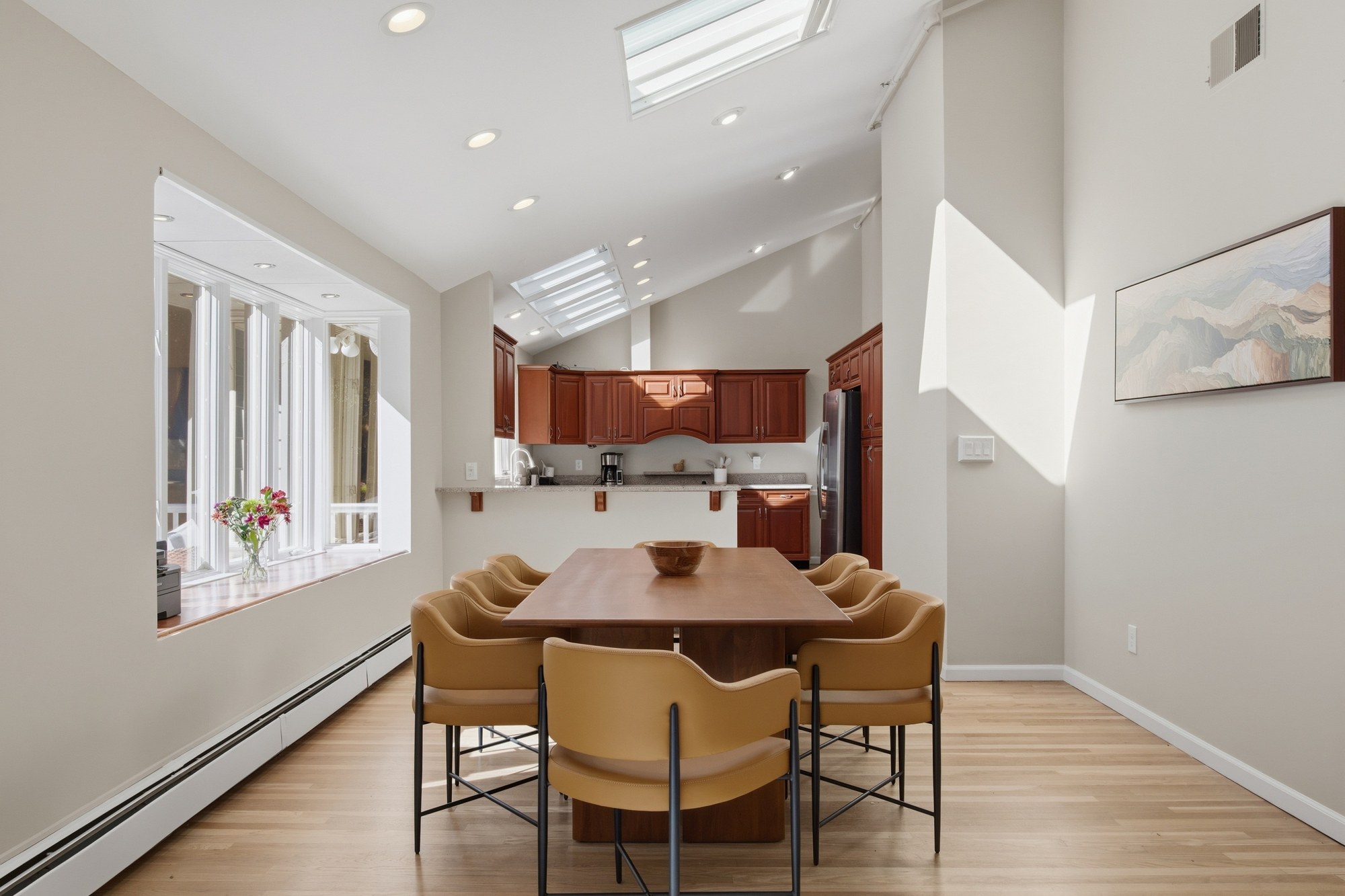 Dining area beneath skylights at Fox Hill Road