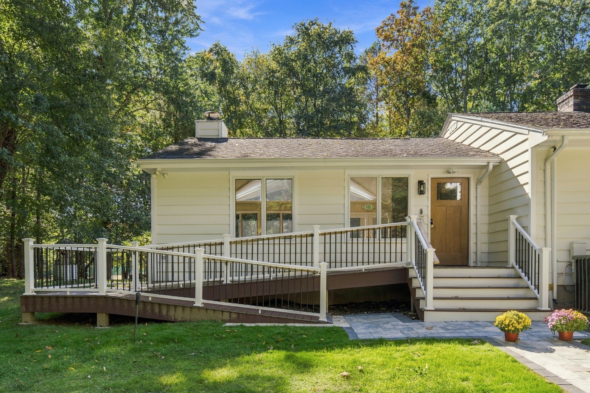 Fox Hill Road home entrance with porch and ramp