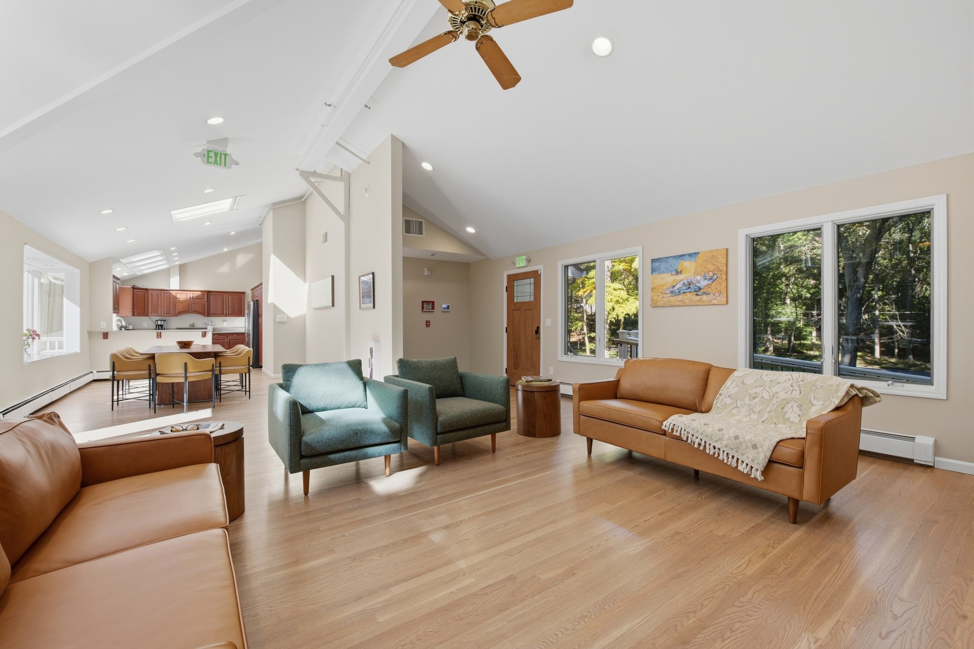 Living area with vaulted ceiling and woodland views at Fox Hill Road