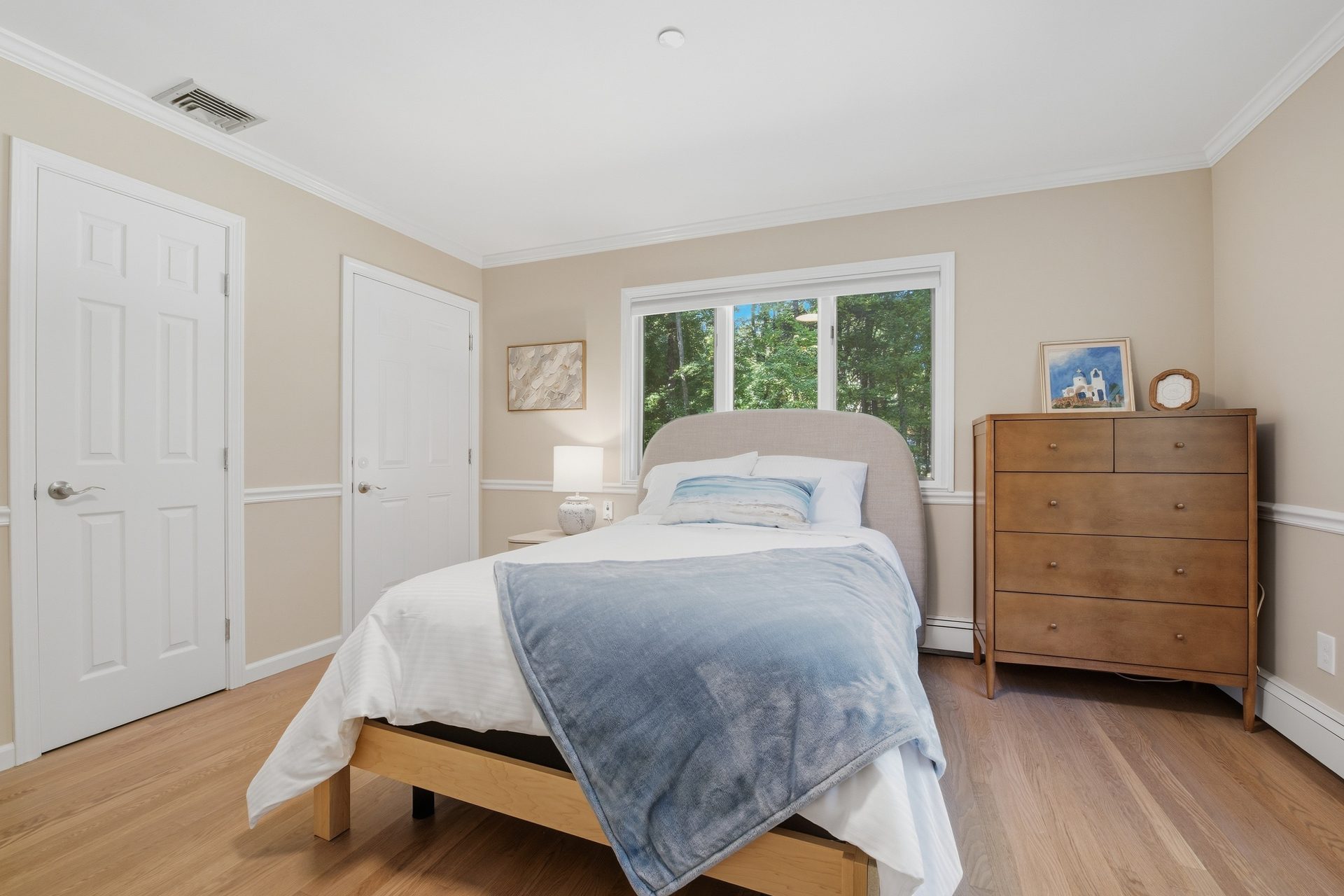 Bright bedroom overlooking the trees