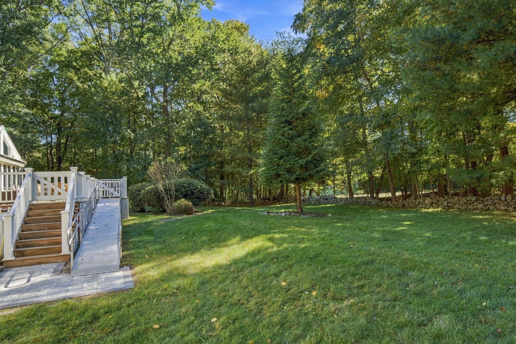 Wooded lawn beside the deck at Fox Hill Road